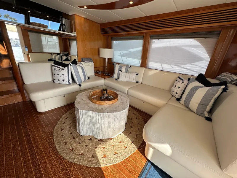 Slide: The Image of Luxurious interior of 2000 Mikelson 61 Sportfisher yacht with elegant seating and decor. - 10