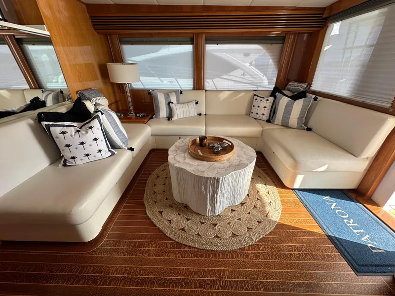 Slide: The Image of Luxurious interior of a 2000 Mikelson 61 Sportfisher yacht with elegant seating and decor. - 11