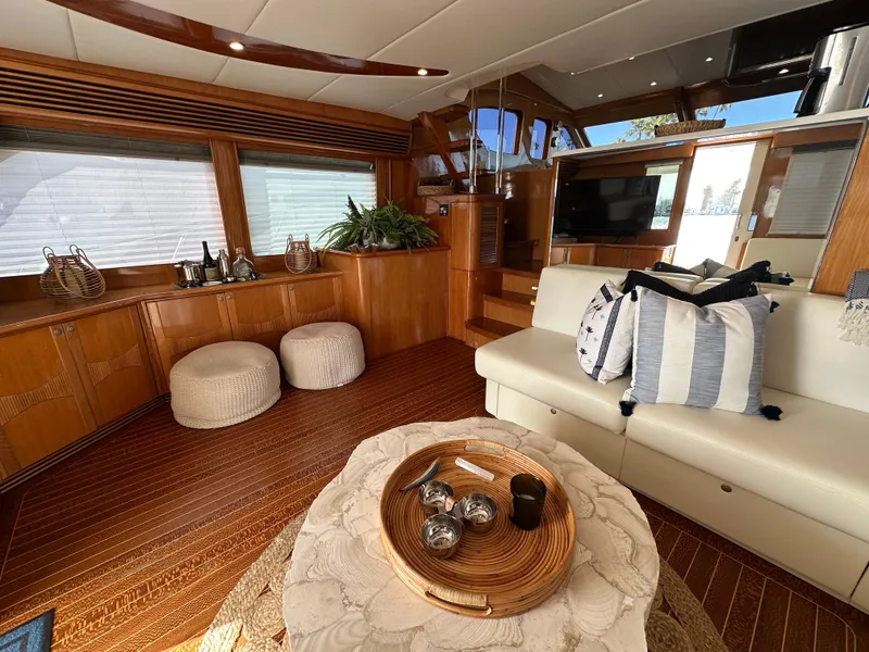 Slide: The Image of Luxurious interior of 2000 Mikelson 61 Sportfisher yacht with elegant wood finishes. - 14