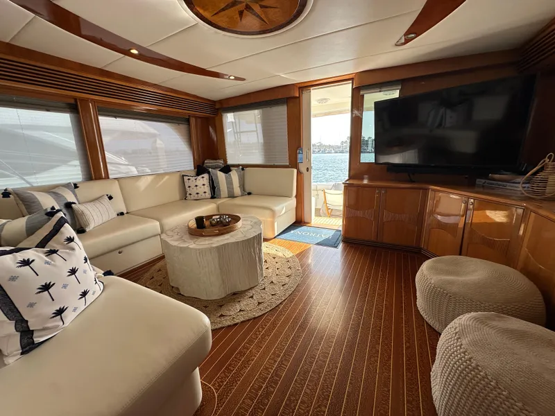 Slide: The Image of Luxurious interior of a 2000 Mikelson 61 Sportfisher yacht with elegant seating and decor. - 15