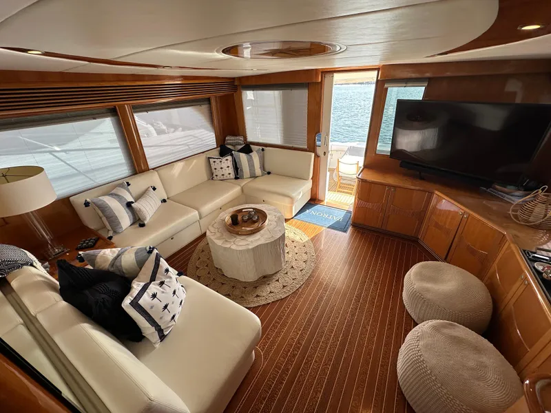 Slide: The Image of Luxurious interior of 2000 Mikelson 61 Sportfisher yacht with elegant seating and decor. - 16