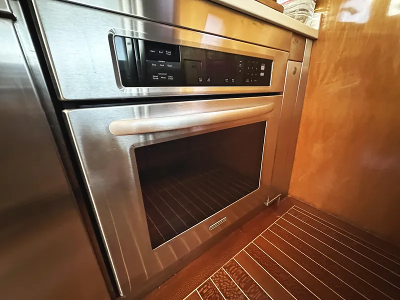 Slide: The Image of Stainless steel oven in a Mikelson 61 Sportfisher yacht kitchen, 2000 model. - 27