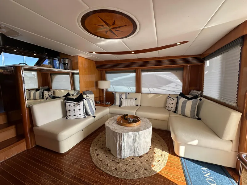 Slide: The Image of Luxurious interior of 2000 Mikelson 61 Sportfisher yacht with elegant seating and decor. - 9