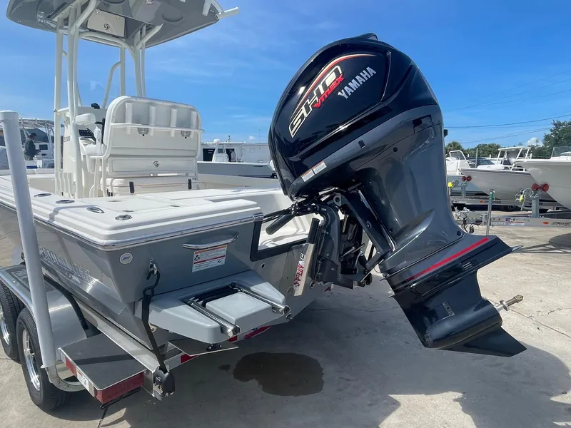 Slide: The Image of 2025 Pathfinder 2200 TRS boat with Yamaha engine, displayed on a trailer. - 2