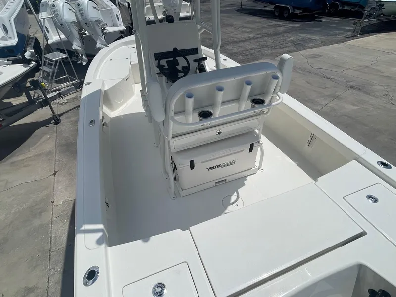 Slide: The Image of 2025 Pathfinder 2200 TRS boat interior with seating and storage compartments. - 3