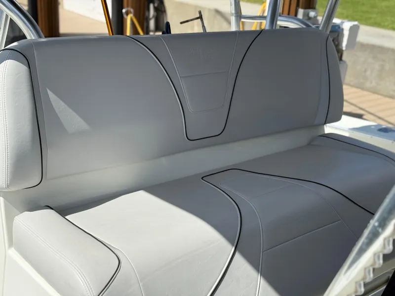 Slide: The Image of 2018 SeaVee 390Z boat seat with sleek gray upholstery and black trim. - 3