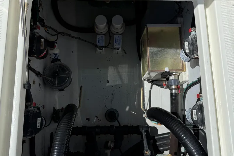 Slide: The Image of 2018 SeaVee 390Z boat interior compartment with wiring and components. - 6