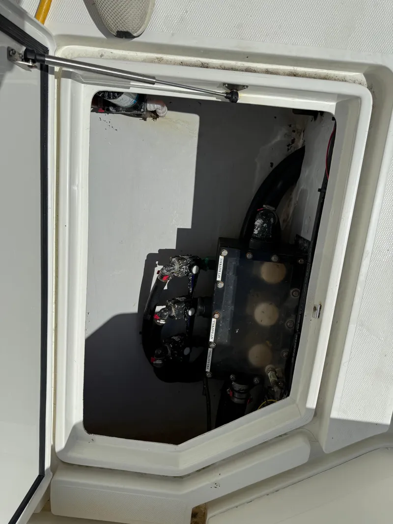 Slide: The Image of 2018 SeaVee 390Z boat compartment with battery setup. - 8