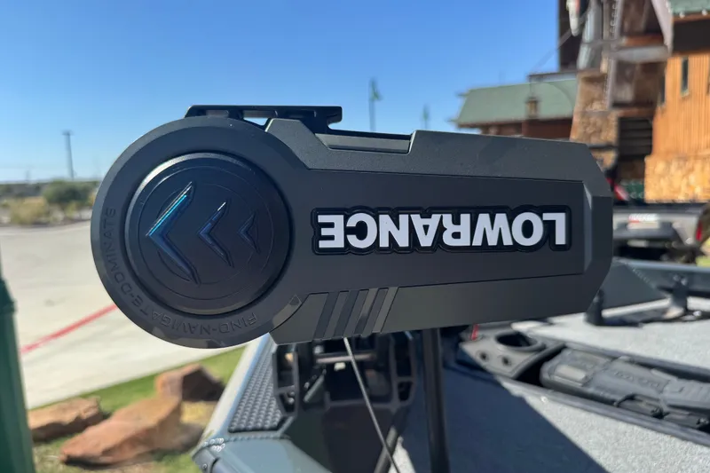 Slide: The Image of Lowrance device on 2025 Ranger RT188 boat, outdoor setting, clear sky background. - 24