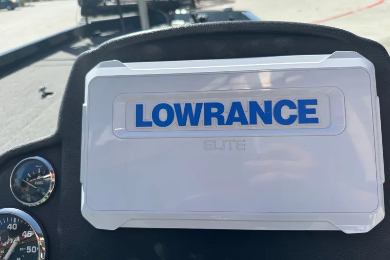Slide: The Image of Lowrance Elite display on 2025 Ranger RT188 boat dashboard with fuel gauge. - 26