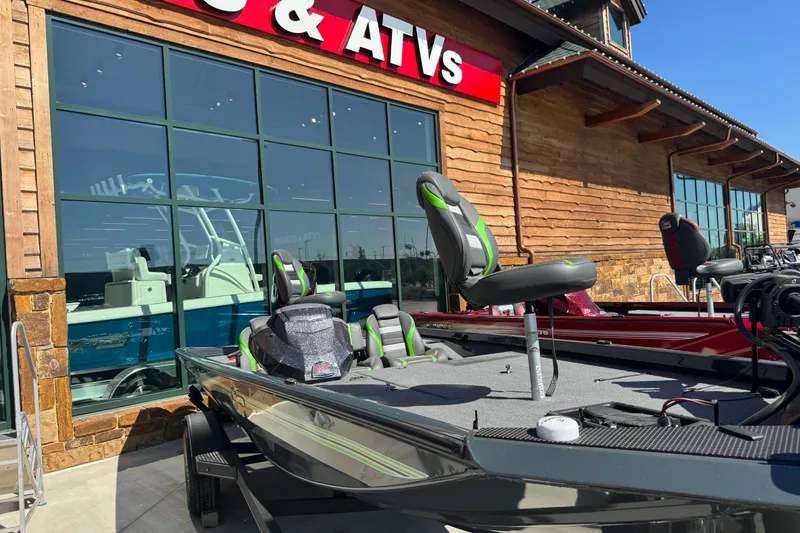 Slide: The Image of 2025 Ranger RT188 boat displayed outside a store with ATVs signage. - 20