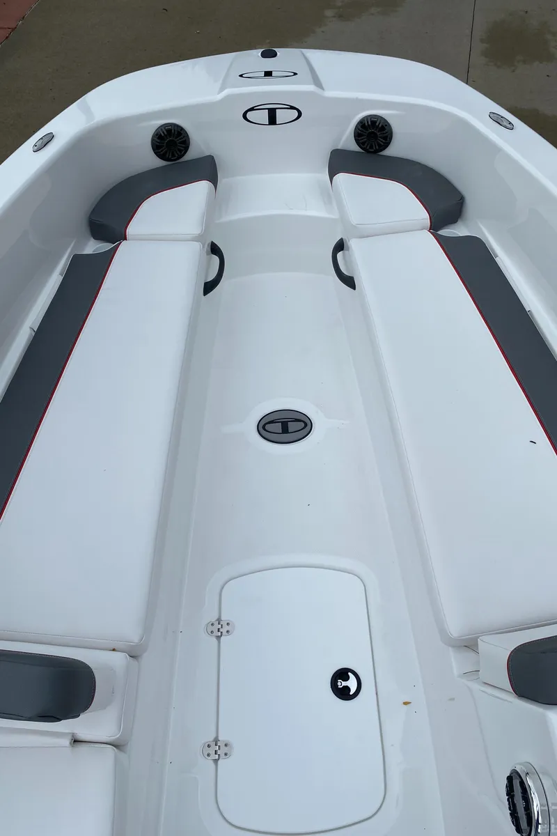 Slide: The Image of 2025 Tahoe T18 boat interior with white seating and gray accents. - 3