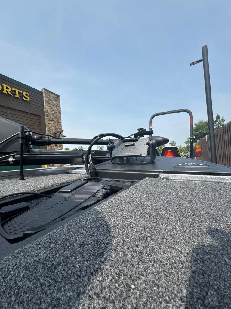 Slide: The Image of 2025 Nitro Z20 XL Pro boat with advanced equipment, parked outdoors. - 3