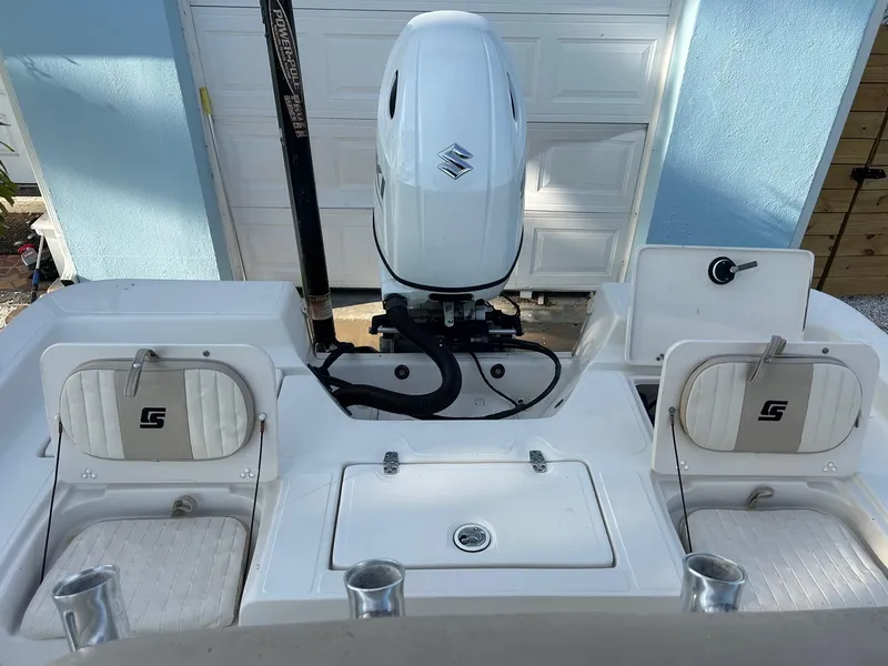 Slide: The Image of 2023 Sea Chaser 23 LX Bay Runner boat with outboard motor and seating. - 5