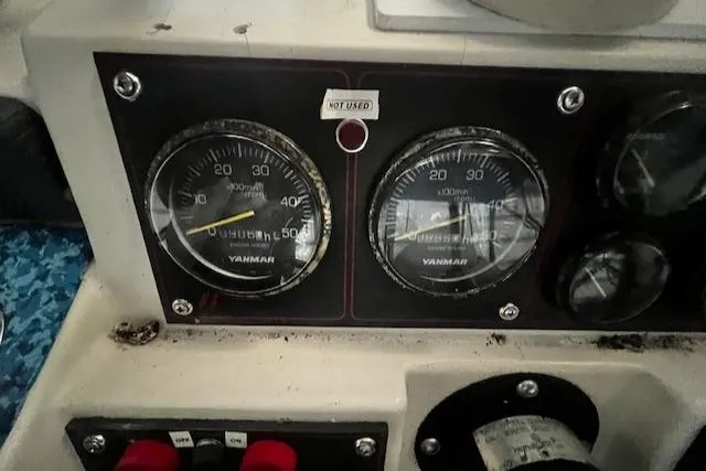 Slide: The Image of Dashboard gauges of a 1985 Bayliner 3870 Motoryacht with Flybridge. - 36