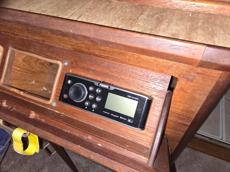 Slide: The Image of Control panel on 1985 Bayliner 3870 Motoryacht with Flybridge, featuring wooden dashboard. - 9