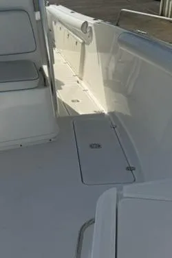Slide: The Image of 2006 Century 3200 Center Console boat interior with seating and storage. - 14