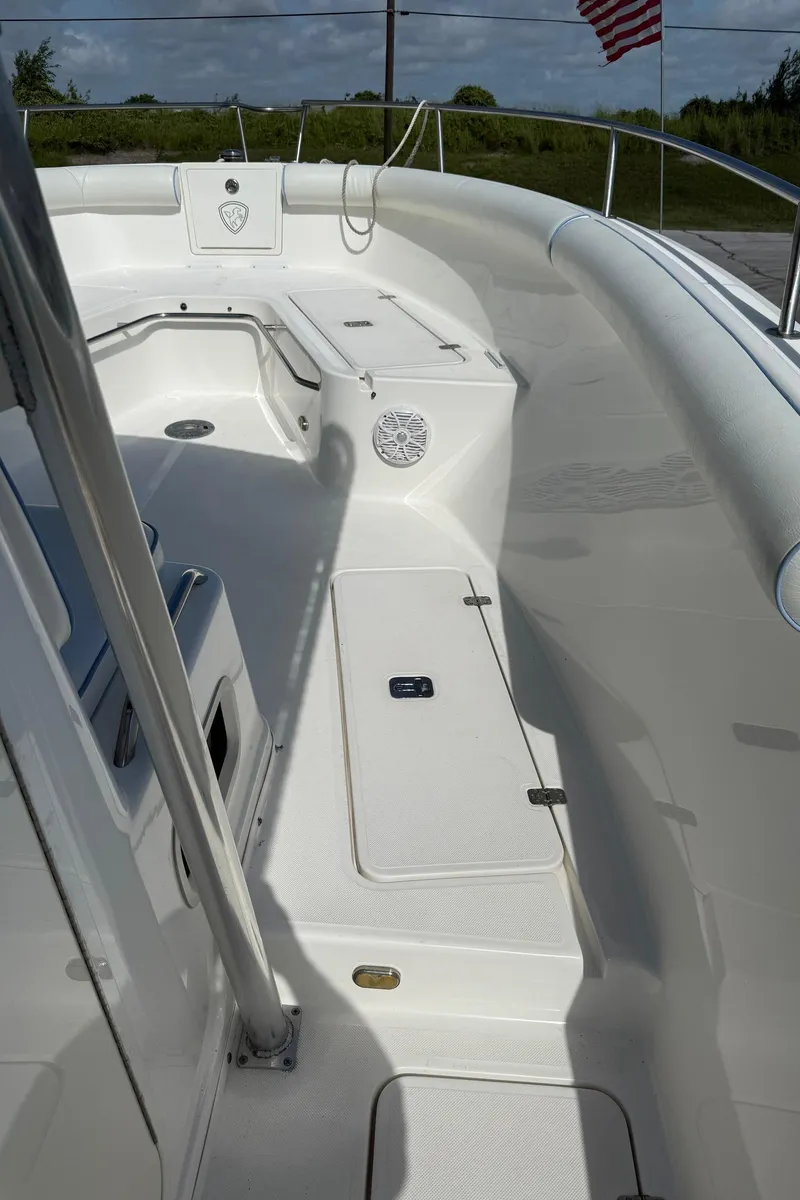 Slide: The Image of 2006 Century 3200 Center Console boat deck with seating and storage compartments. - 16