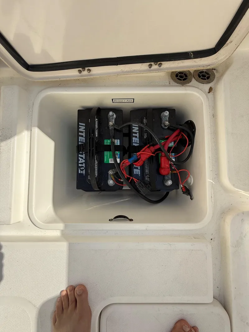 Slide: The Image of Battery compartment of a 2006 Century 3200 Center Console boat. - 24