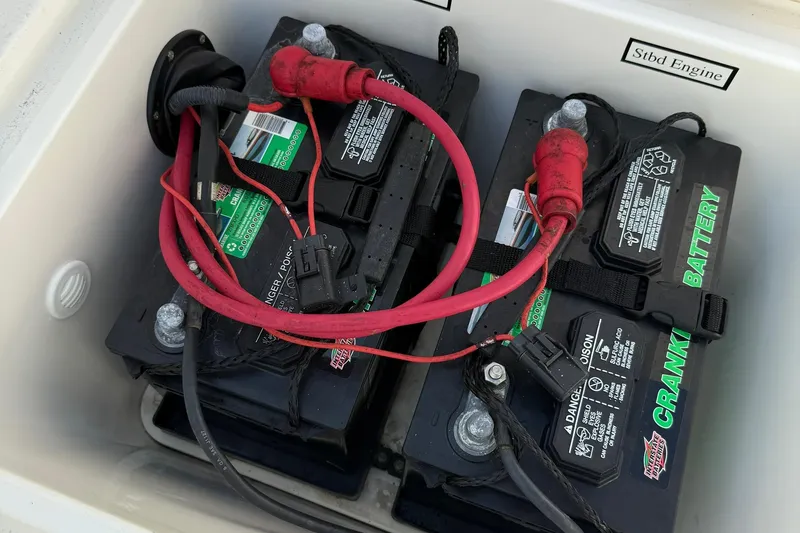Slide: The Image of Batteries in a 2006 Century 3200 Center Console boat's engine compartment. - 25
