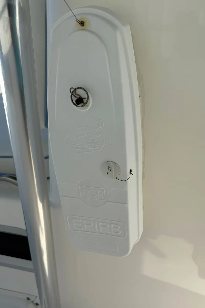 Slide: The Image of 2006 Century 3200 Center Console EPIRB mount on boat. - 27