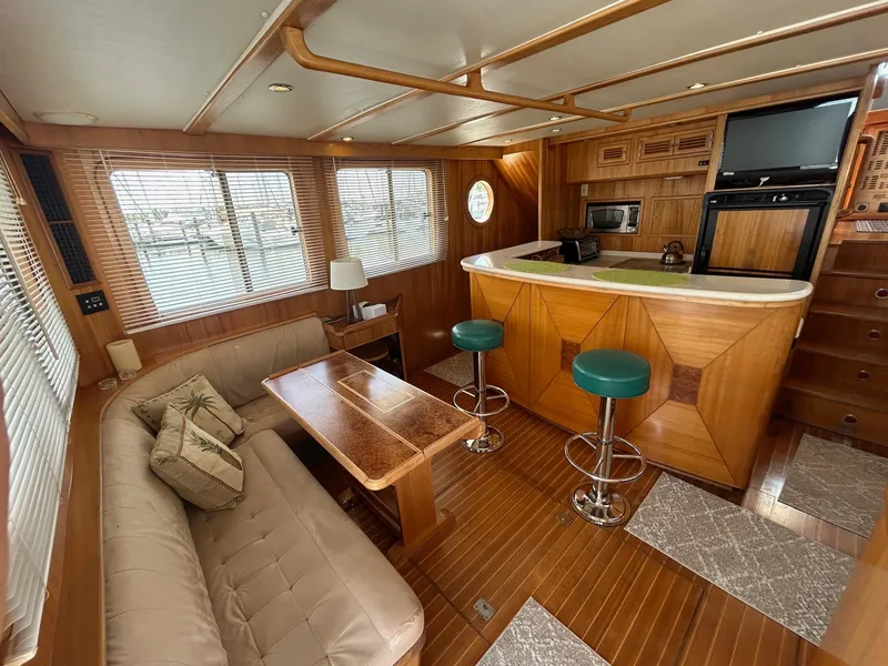 Slide: The Image of Luxurious interior of 1999 Selene 43 yacht with cozy seating and modern amenities. - 22