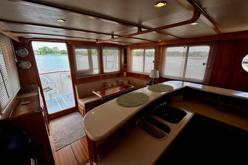 Slide: The Image of Luxurious interior of 1999 Selene 43 yacht with scenic water view. - 26