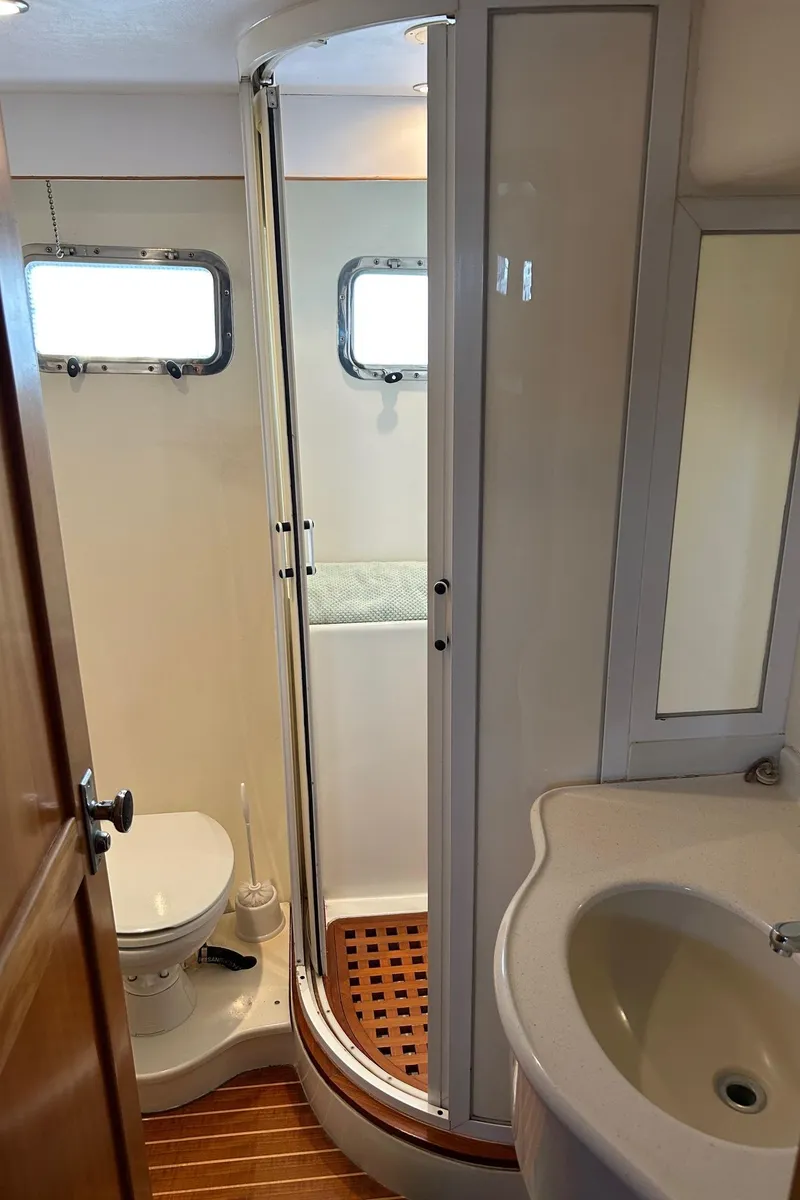 Slide: The Image of Bathroom interior of a 1999 Selene 43 yacht with shower and toilet. - 38