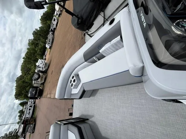 Slide: The Image of 2025 Veranda VS22RC pontoon boat with sleek seating and modern design. - 10