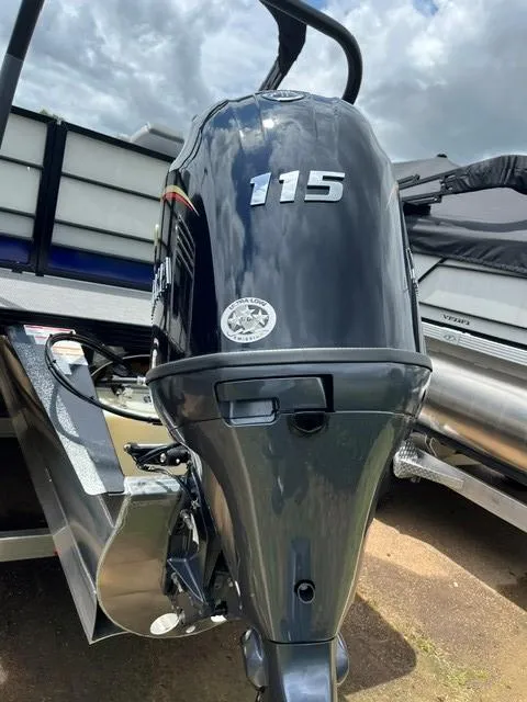 Slide: The Image of 2025 Veranda VS22RC boat with 115 horsepower outboard motor, displayed outdoors. - 12