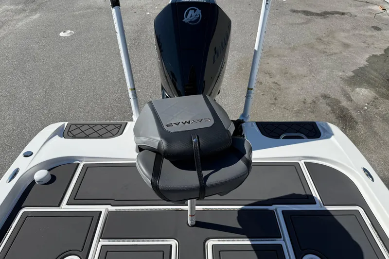Slide: The Image of 2025 Caymas XS 21 boat deck with seat and motor, showcasing modern design. - 17