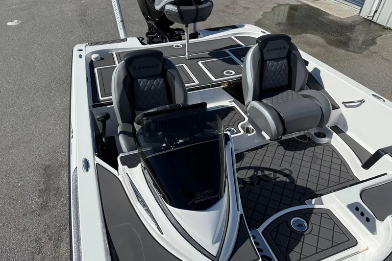 Slide: The Image of 2025 Caymas XS 21 boat interior with dual seats and sleek design. - 9