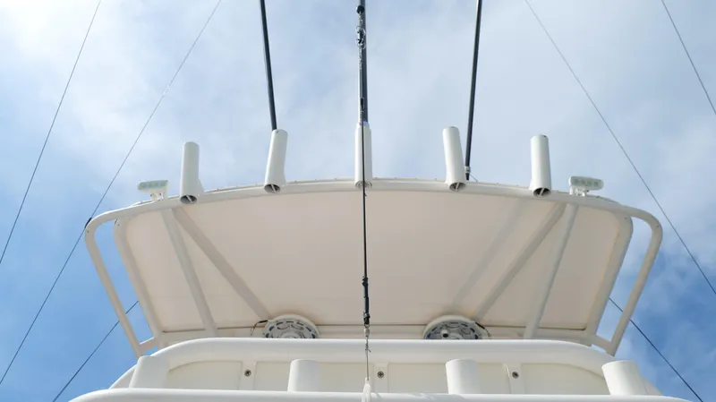 Slide: The Image of 2004 Jupiter 31 FS boat, viewed from below against a cloudy sky. - 35