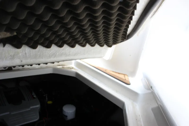 Slide: The Image of Engine compartment of 2012 Bayliner 315 Cruiser with soundproofing foam. - 14