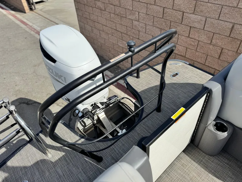 Slide: The Image of 2023 Godfrey Monaco 255 C boat with Suzuki outboard motor, rear deck view. - 22