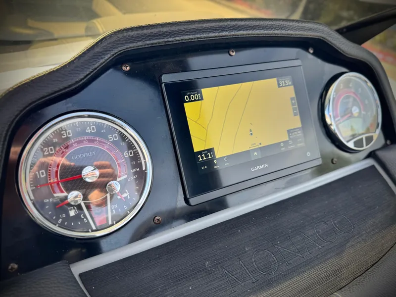 Slide: The Image of Dashboard of 2023 Godfrey Monaco 255 C with Garmin navigation display. - 27