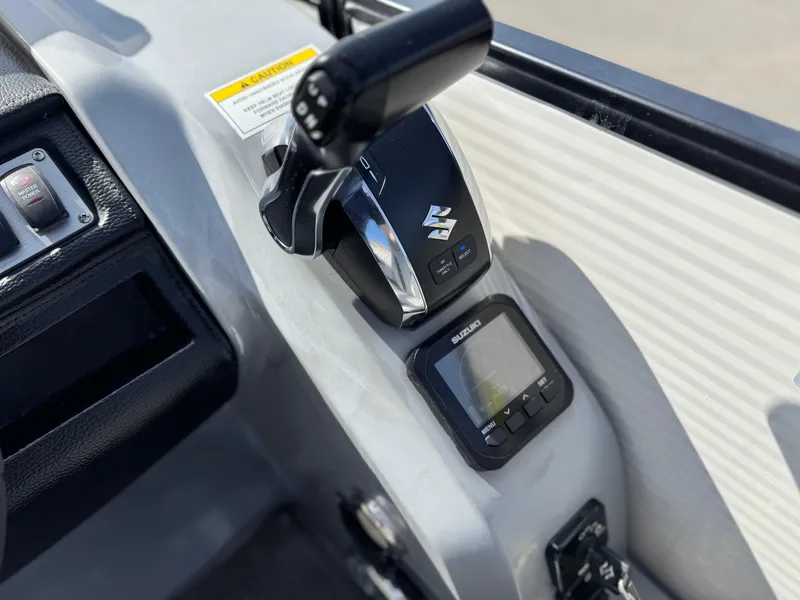 Slide: The Image of Control panel of 2023 Godfrey Monaco 255 C boat with throttle and display. - 30