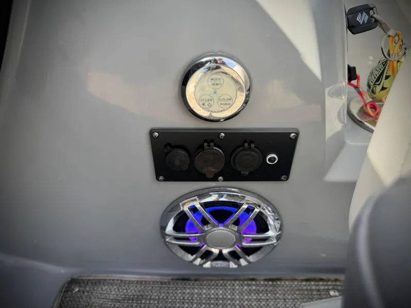 Slide: The Image of Control panel and speaker on 2023 Godfrey Monaco 255 C boat. - 31