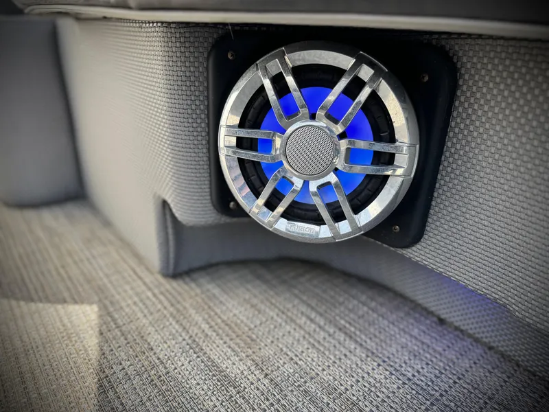 Slide: The Image of Speaker with blue LED light on 2023 Godfrey Monaco 255 C boat interior. - 32