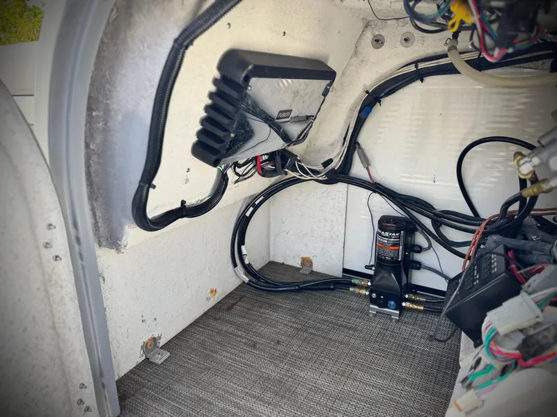 Slide: The Image of Electrical wiring and components inside a 2023 Godfrey Monaco 255 C boat. - 35