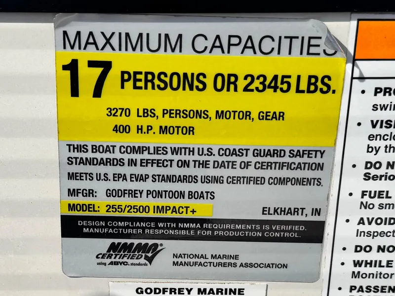 Slide: The Image of Maximum capacity label for 2023 Godfrey Monaco 255 C, 17 persons or 2345 lbs, 400 HP motor. - 36