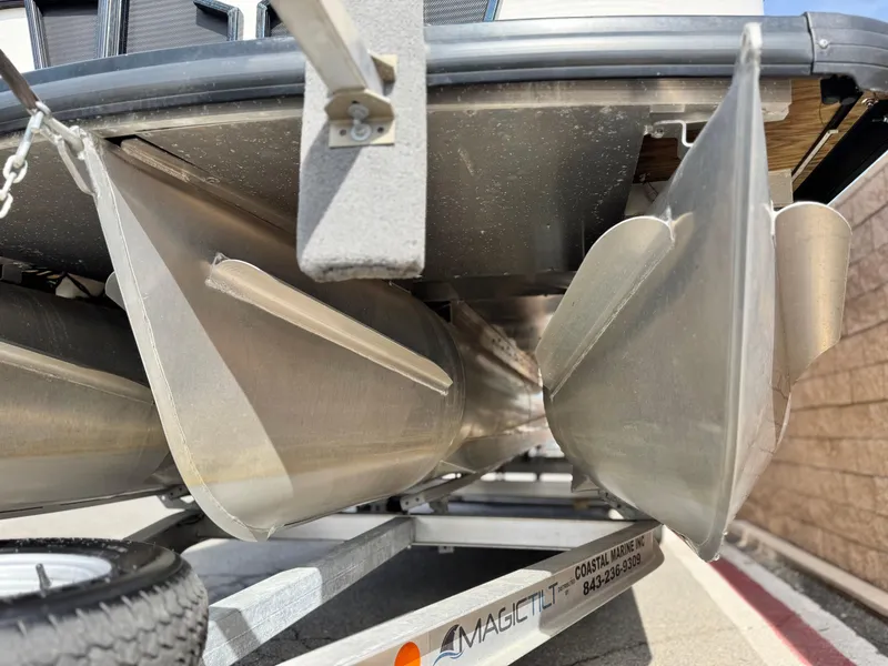 Slide: The Image of Underneath view of 2023 Godfrey Monaco 255 C pontoon boat on trailer. - 4