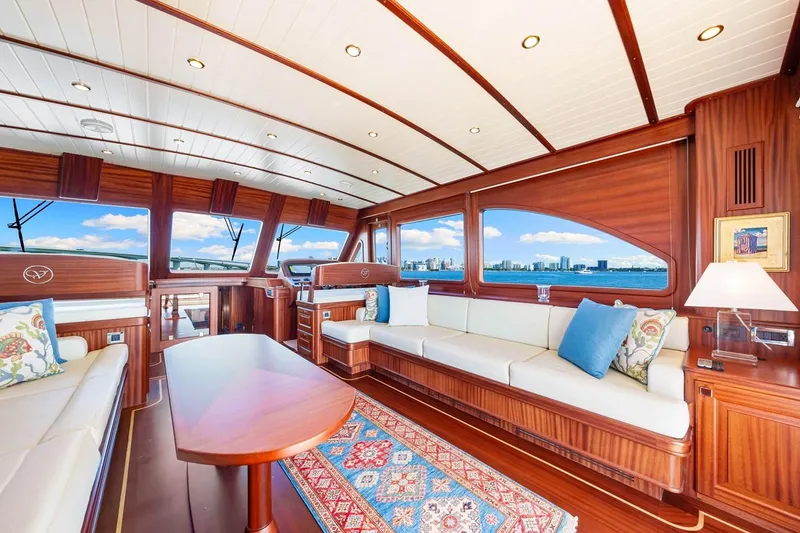 Slide: The Image of Luxurious interior of 2024 Vicem 62 Classic yacht with elegant wood finish and scenic ocean view. - 12