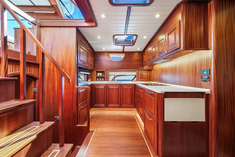 Slide: The Image of Luxurious interior of 2024 Vicem 62 Classic yacht with elegant wood finishes and modern design. - 17