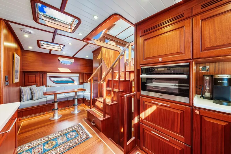 Slide: The Image of Luxurious interior of 2024 Vicem 62 Classic yacht with elegant wood finishes and modern amenities. - 20