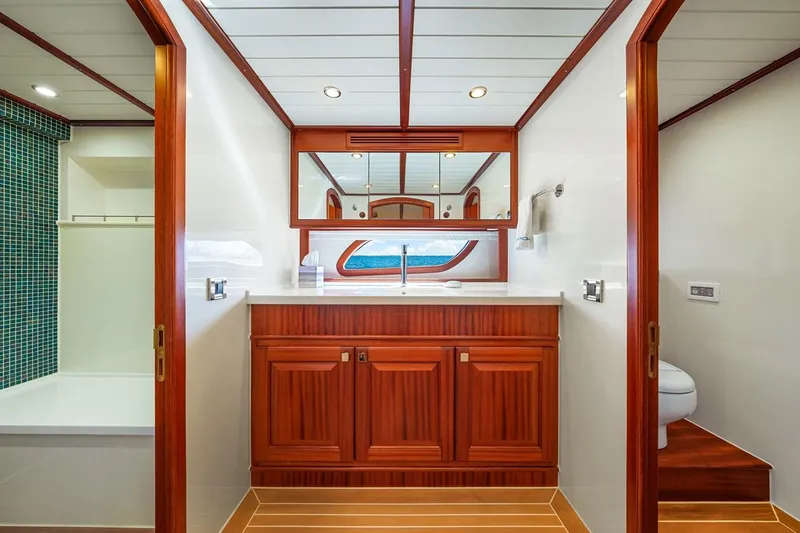 Slide: The Image of Luxurious bathroom interior of 2024 Vicem 62 Classic yacht with wood accents and modern fixtures. - 24