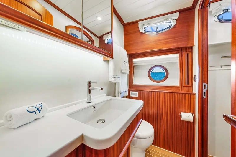 Slide: The Image of Luxurious bathroom in 2024 Vicem 62 Classic yacht with elegant wood finish and modern fixtures. - 26