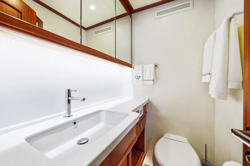 Slide: The Image of Luxurious bathroom in 2024 Vicem 62 Classic yacht with modern fixtures and elegant design. - 29