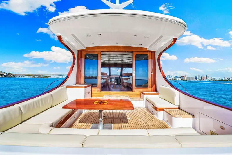 Slide: The Image of 2024 Vicem 62 Classic yacht with luxurious seating and ocean view. - 7