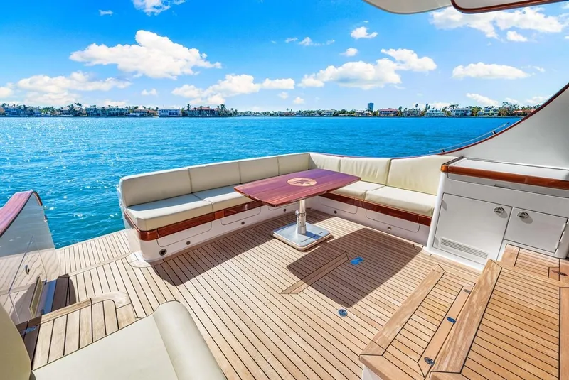 Slide: The Image of Luxurious 2024 Vicem 62 Classic yacht deck with elegant seating and ocean view. - 8